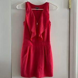 Like new! Super cute and soft coral romper with pockets